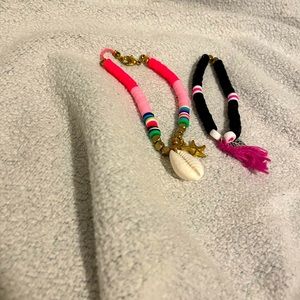 Play bead, pink, and purple bracelet